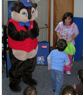 Kids love Buddy Beaver from Pediatric Dental Healthcare!